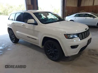 2018 Jeep Grand Cherokee Altitude with VIN 1C4RJFAG3JC120894, listed as a IAAI auction lot 42570630 with 144,716 mi miles and . Bid and sale history available at DreamBid. Image 1.