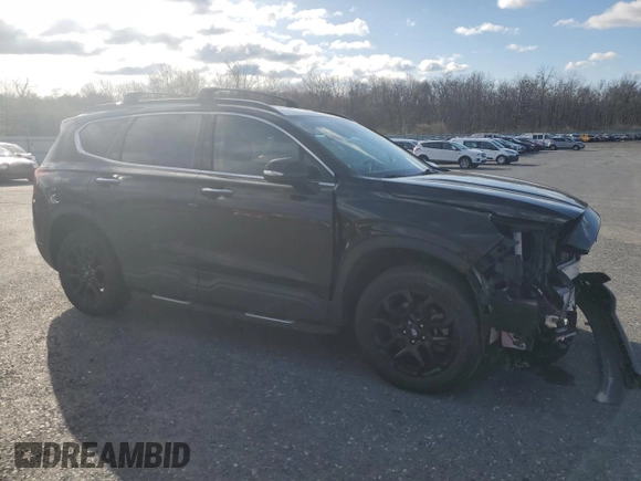 2022 Hyundai Santa Fe XRT with VIN 5NMS6DAJ4NH437593, listed as a Copart auction lot 52321275 with 51,047 mi miles and Salvage Title. Bid and sale history available at carsss.com. Image 4.