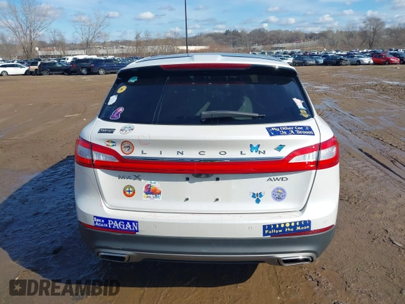 2016 Lincoln MKX Reserve with VIN 2LMTJ8LR4GBL44989, listed as a IAAI auction lot 41684823 with 101,528 mi miles. Bid and sale history available at carsss.com. Image 16.