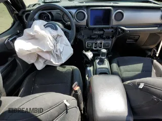 2021 Jeep Gladiator 80th Anniversary с VIN 1C6HJTAG2ML513632, выставлен на аукционе Copart как лот 57140595 с пробегом Не указан миль и Списание • Salvage title. История ставок и продаж доступна на DreamBid. Изображение 8.