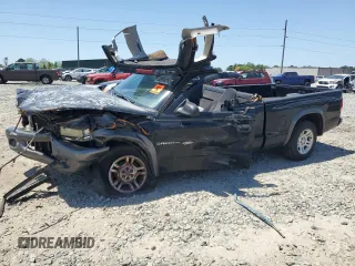 2002 Dodge Dakota с VIN 1B7GL12X92S578496, выставлен на аукционе Copart как лот 53506265 с пробегом Не указан миль и Списание • Salvage title. История ставок и продаж доступна на DreamBid. Изображение 1.