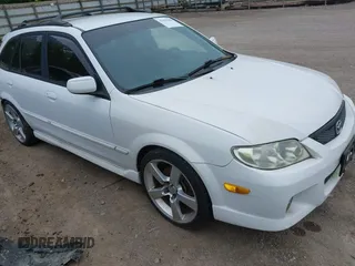 2002 Mazda Protege with VIN JM1BJ245021508764, listed as a IAAI auction lot 42198285 with 237,386 mi miles and . Bid and sale history available at DreamBid. Image 1.