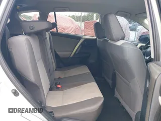 2014 Toyota RAV4 LE with VIN 2T3BFREV1EW143929, listed as a IAAI auction lot 42101167 with 124,076 mi miles and . Bid and sale history available at DreamBid. Image 8.