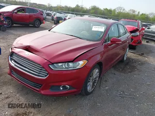 2014 Ford Fusion SE with VIN 3FA6P0HD6ER198299, listed as a IAAI auction lot 42020385 with 128,669 mi miles. Bid and sale history available at carsss.com. Image 2.