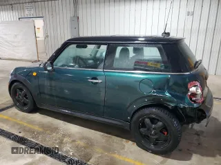 2008 MINI Hardtop with VIN WMWMF33558TT66729, listed as a Copart auction lot 51153645 with 127,357 mi miles and Salvage Title. Bid and sale history available at DreamBid. Image 2.