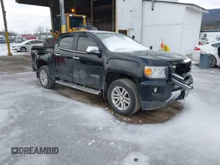 2015 GMC Canyon 4WD SLT with VIN 1GTG6CE39F1202730, listed as a IAAI auction lot 41510275 with 114,444 mi miles. Bid and sale history available at carsss.com. Image 1.