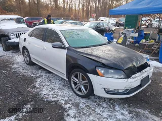 2014 Volkswagen Passat SEL Premium z VIN 1VWCN7A32EC073471, wystawiony jako IAAI lot #41344779 z przebiegiem 81 383 mil mil oraz . Historia ofert i sprzedaży dostępna na DreamBid. Obrazek 1.