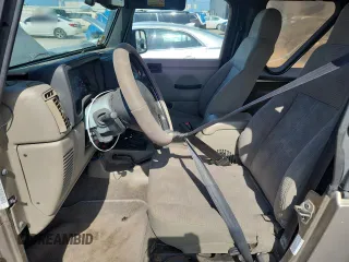 2003 Jeep Wrangler Rubicon with VIN 1J4FA69S13P310131, listed as a Copart auction lot 59139025 with 260,349 mi miles and Salvage title. Bid and sale history available at DreamBid. Image 7.
