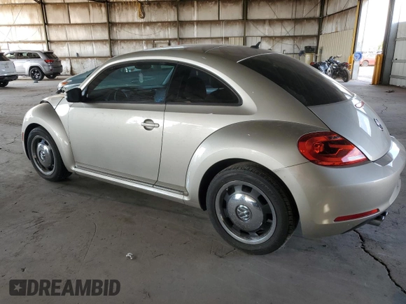 2012 Volkswagen Beetle 2.5L with VIN 3VWHX7AT5CM643314, listed as a Copart auction lot 58843455 with 72,448 mi miles and Salvage title. Bid and sale history available at DreamBid. Image 2.