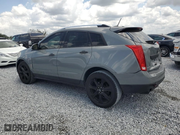 2014 Cadillac SRX Premium Collection z VIN 3GYFNGE30ES627895, wystawiony jako Copart lot #58605985 z przebiegiem 49 300 mil mil oraz Szkoda całkowita • Salvage title. Historia ofert i sprzedaży dostępna na DreamBid. Obrazek 2.