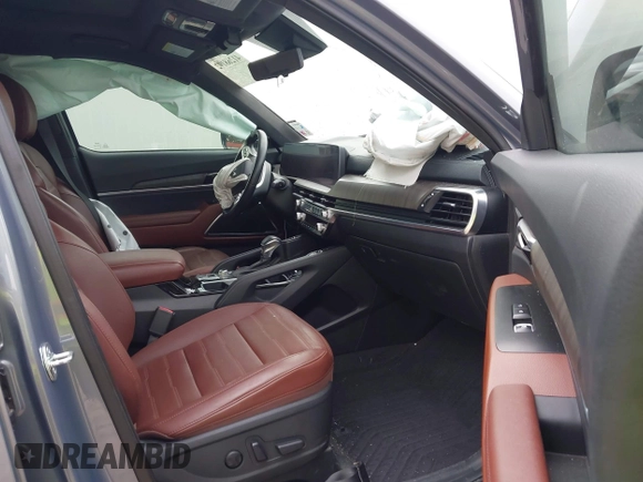 2023 Kia Telluride SX Prestige X-Line z VIN 5XYP5DGCXPG399768, wystawiony jako IAAI lot #41268192 z przebiegiem 19 284 mil mil oraz . Historia ofert i sprzedaży dostępna na DreamBid. Obrazek 5.