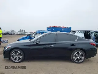 2023 Infiniti Q50 Sensory z VIN JN1EV7CP9PM511527, wystawiony jako IAAI lot #42490195 z przebiegiem 34 031 mil mil oraz . Historia ofert i sprzedaży dostępna na DreamBid. Obrazek 14.