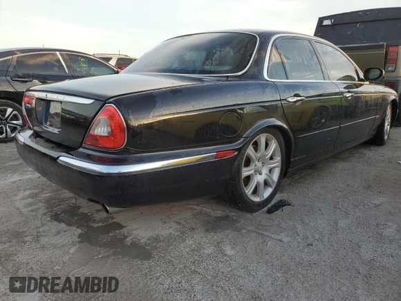 2004 Jaguar XJ with VIN SAJWA71C04SG31354, listed as a Copart auction lot 73742404 with 0 mi miles and Non Repairable. Bid and sale history available at carsss.com. Image 3.