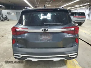 2021 Kia Seltos SX with VIN KNDETCA2XM7167199, listed as a Copart auction lot 52080495 with 82,981 mi miles and Salvage Title. Bid and sale history available at carsss.com. Image 6.