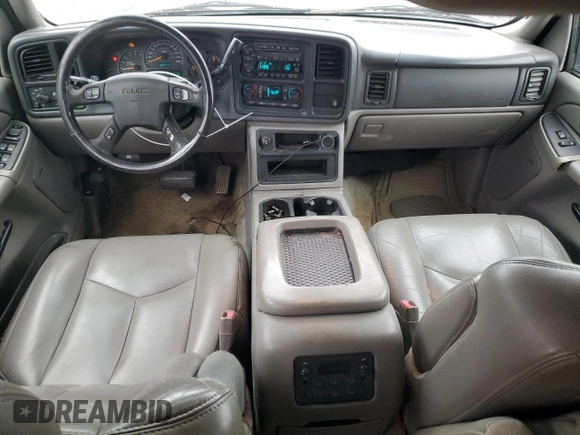 2005 GMC Yukon SLT z VIN 1GKEC13T35J119126, wystawiony jako Copart lot #47849455 z przebiegiem 301 785 mil mil oraz Szkoda całkowita • Salvage title. Historia ofert i sprzedaży dostępna na DreamBid. Obrazek 8.