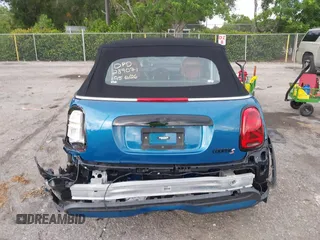 2022 MINI Convertible Cooper S z VIN WMW43DL06N3P19784, wystawiony jako IAAI lot #42635816 z przebiegiem 17 053 mil mil oraz . Historia ofert i sprzedaży dostępna na DreamBid. Obrazek 17.