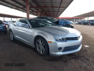 2015 Chevrolet Camaro LS z VIN 2G1FB1E37F9104909, wystawiony jako IAAI lot #42192531 z przebiegiem 96 027 mil mil oraz . Historia ofert i sprzedaży dostępna na DreamBid. Obrazek 1.