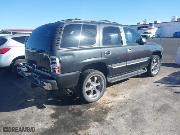 2004 Chevrolet Tahoe LT with VIN 1GNEC13Z44R289535, listed as a IAAI auction lot 41681721 with 298,366 mi miles. Bid and sale history available at carsss.com. Image 4.