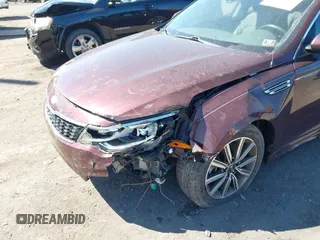 2019 Kia Optima EX with VIN 5XXGU4L12KG292041, listed as a IAAI auction lot 42065738 with 74,222 mi miles and . Bid and sale history available at carsss.com. Image 6.