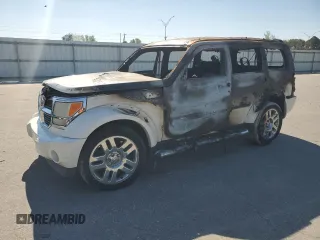 2008 Dodge Nitro SLT z VIN 1D8GT58K08W116382, wystawiony jako Copart lot #50409025 z przebiegiem Nie podano mil oraz Szkoda całkowita • Salvage title. Historia ofert i sprzedaży dostępna na DreamBid. Obrazek 1.