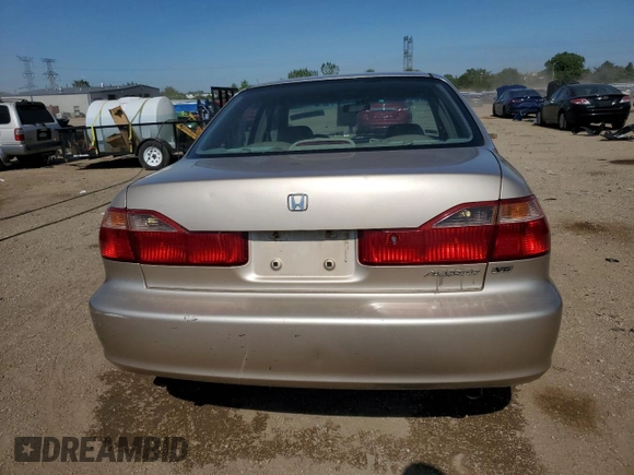 2000 Honda Accord EX z VIN 1HGCG165XYA098317, wystawiony jako Copart lot #57246705 z przebiegiem 242 166 mil mil oraz Szkoda całkowita • Salvage title. Historia ofert i sprzedaży dostępna na DreamBid. Obrazek 6.