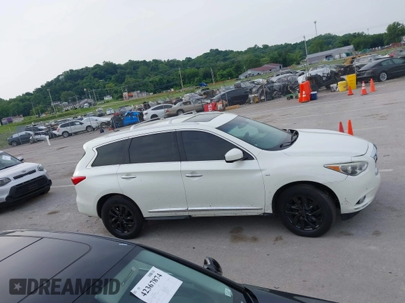 2015 Infiniti QX60 with VIN 5N1AL0MM6FC543767, listed as a IAAI auction lot 42409275 with 128,128 mi miles and . Bid and sale history available at DreamBid. Image 13.