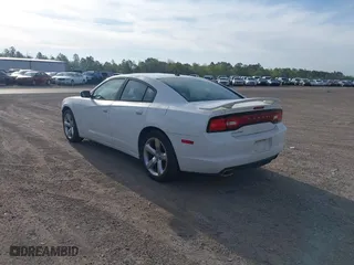 2011 Dodge Charger SE with VIN 2B3CL3CG3BH506825, listed as a IAAI auction lot 41882433 with 209,712 mi miles. Bid and sale history available at carsss.com. Image 3.