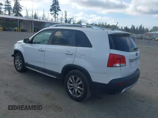 2011 Kia Sorento EX with VIN 5XYKUDA22BG178350, listed as a IAAI auction lot 42225234 with 107,674 mi miles and . Bid and sale history available at DreamBid. Image 3.