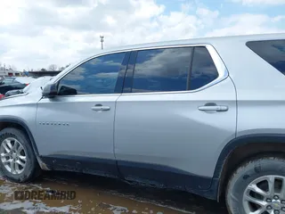 2021 Chevrolet Traverse LS with VIN 1GNEVFKWXMJ115319, listed as a IAAI auction lot 42005816 with 91,810 mi miles and . Bid and sale history available at DreamBid. Image 14.