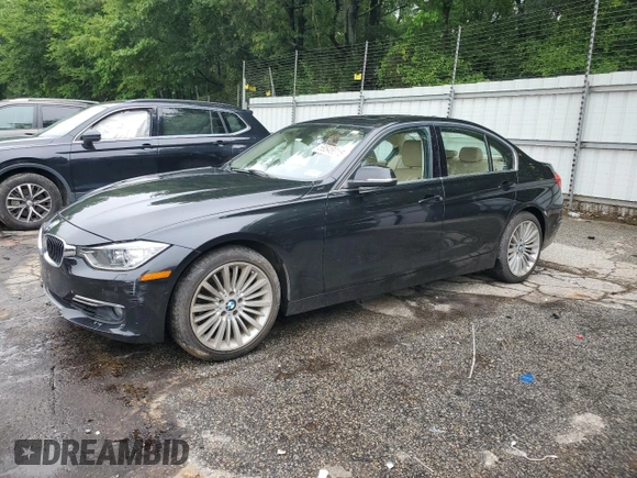 2014 BMW 3 Series 328i with VIN WBA3C1C5XEK105543, listed as a Copart auction lot 58548015 with 156,721 mi miles and Salvage title. Bid and sale history available at DreamBid. Image 1.
