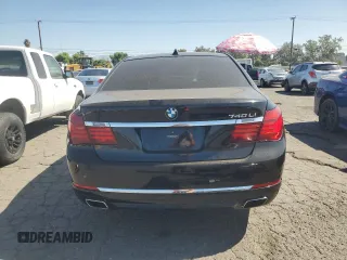 2015 BMW 7 Series 740Li with VIN WBAYE4C59FD947328, listed as a Copart auction lot 68987863 with 117,312 mi miles and . Bid and sale history available at DreamBid. Image 6.