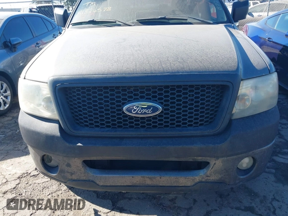 2006 Ford F-150 STX with VIN 1FTRX12W26FB77570, listed as a IAAI auction lot 41326578 with 425,752 mi miles and . Bid and sale history available at DreamBid. Image 6.