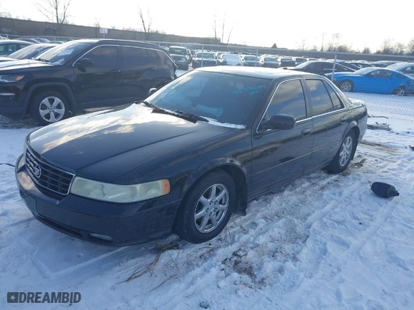 2004 Cadillac Seville Luxury SLS with VIN 1G6KS54Y34U152341, listed as a IAAI auction lot 41299249 with 231,034 mi miles. Bid and sale history available at carsss.com. Image 2.