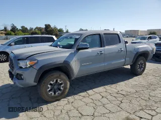2021 Toyota Tacoma SR5 with VIN 3TMDZ5BN5MM107206, listed as a Copart auction lot 58363175 with 82,204 mi miles and Salvage title. Bid and sale history available at DreamBid. Image 1.