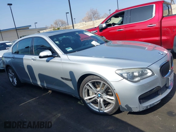 2015 BMW 7 Series 750Li with VIN WBAYE8C5XFD782039, listed as a IAAI auction lot 41505626 with 74,716 mi miles. Bid and sale history available at carsss.com. Image 13.