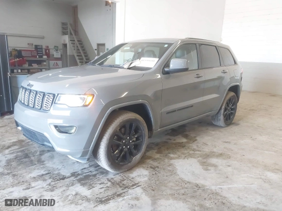 2022 Jeep Grand Cherokee WK Laredo X with VIN 1C4RJFAG8NC112280, listed as a IAAI auction lot 41590680 with 62,072 mi miles. Bid and sale history available at carsss.com. Image 21.