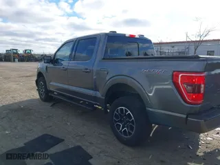 2023 Ford F-150 XL with VIN 1FTEW1EPXPFB48020, listed as a IAAI auction lot 41219055 with 7,405 mi miles. Bid and sale history available at carsss.com. Image 3.