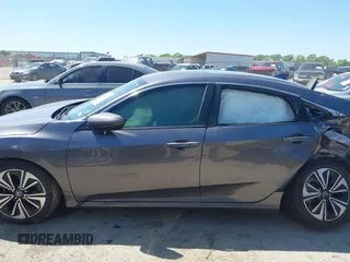 2016 Honda Civic EX-L with VIN 2HGFC1F77GH640323, listed as a IAAI auction lot 41969858 with Not provided miles and . Bid and sale history available at DreamBid. Image 13.
