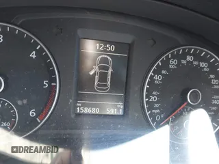2013 Volkswagen Passat SEL Premium z VIN 1VWCN7A39DC036013, wystawiony jako IAAI lot #41632682 z przebiegiem 158 680 mil mil oraz . Historia ofert i sprzedaży dostępna na DreamBid. Obrazek 7.