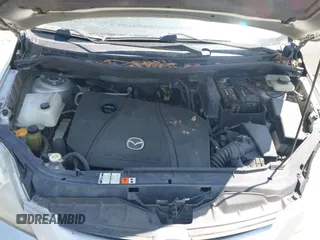 2007 Mazda 5 Touring with VIN JM1CR293970132132, listed as a IAAI auction lot 42275357 with 152,683 mi miles and . Bid and sale history available at DreamBid. Image 10.