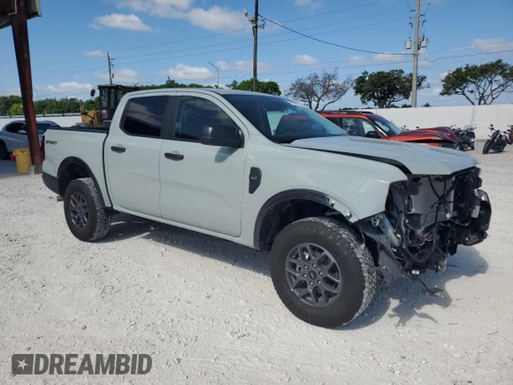 2024 Ford Ranger XLT with VIN 1FTER4GH7RLE74280, listed as a Copart auction lot 57282575 with 5,423 mi miles and Salvage title. Bid and sale history available at DreamBid. Image 4.