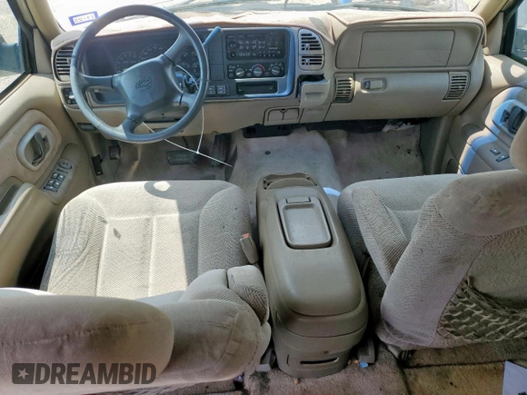 1999 Chevrolet Suburban z VIN 3GNFK16R2XG191868, wystawiony jako Copart lot #57620165 z przebiegiem 128 526 mil mil oraz Szkoda całkowita • Salvage title. Historia ofert i sprzedaży dostępna na DreamBid. Obrazek 8.