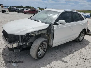 2018 Audi Q3 Premium with VIN WA1ECCFS1JR034690, listed as a Copart auction lot 55047735 with 73,488 mi miles and Salvage title. Bid and sale history available at DreamBid. Image 1.