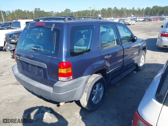 2003 Ford Escape XLS Popular with VIN 1FMYU02133KA02990, listed as a IAAI auction lot 41803174 with 140,792 mi miles. Bid and sale history available at carsss.com. Image 4.