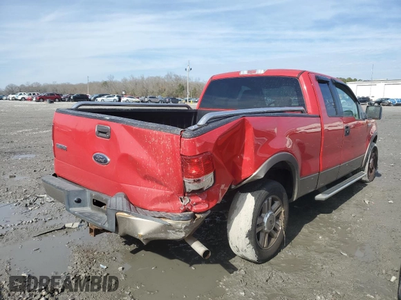 2005 Ford F-150 XLT with VIN 1FTPX12525NA40969, listed as a Copart auction lot 42563695 with 92,536 mi miles and Salvage Title. Bid and sale history available at carsss.com. Image 3.