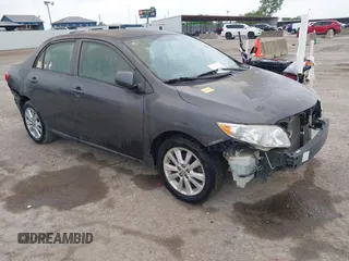 2009 Toyota Corolla with VIN 1NXBU40E19Z049810, listed as a IAAI auction lot 42160703 with 165,342 mi miles. Bid and sale history available at carsss.com. Image 1.