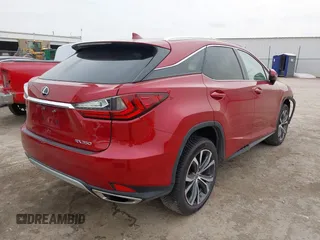 2022 Lexus RX 350 with VIN JTJHZMDAXN2058225, listed as a IAAI auction lot 42059802 with 63,407 mi miles and . Bid and sale history available at DreamBid. Image 4.