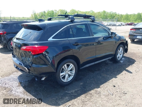 2014 Acura RDX Technology with VIN 5J8TB3H57EL000142, listed as a IAAI auction lot 42024324 with 123,946 mi miles and . Bid and sale history available at carsss.com. Image 4.