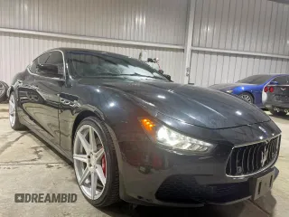 2014 Maserati Ghibli S Q4 z VIN ZAM57RTA9E1112724, wystawiony jako Copart lot #57189295 z przebiegiem 45 525 mil mil oraz Szkody całkowita. Historia ofert i sprzedaży dostępna na DreamBid. Obrazek 1.