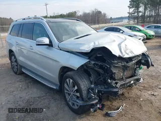 2015 Mercedes-Benz GL-Class GL 450 with VIN 4JGDF6EE9FA503998, listed as a IAAI auction lot 41681096 with 140,440 mi miles. Bid and sale history available at carsss.com. Image 1.
